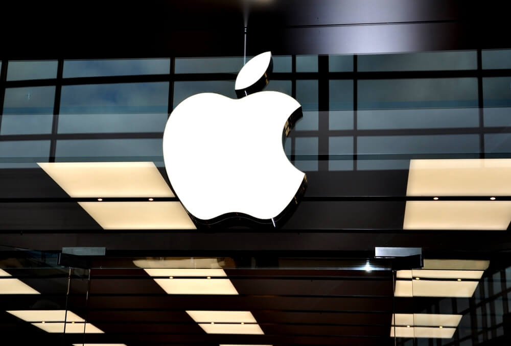 A sign of an Apple company in front of their Toronto store.